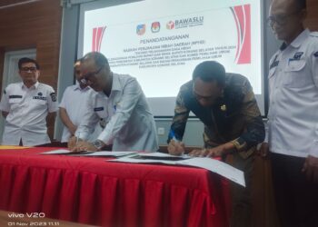 Penandatanganan NPHD antara Pemda, KPU dan Bawaslu Konsel