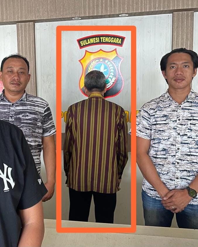 Tersangka saat ditahan pihak Polres Kendari