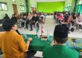 Wakil Ketua KI Pusat saat memberikan kuliah umum