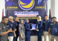 Giona Nur Alam saat mengembalikan berkas pendaftaran Cawali Kendari di DPP NasDem