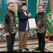 DPP PPP saat menyerahkan SK B.1-KWK kepasa Paslon Herman Pambahako-Herianto