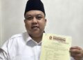 Yudhianto Mahardika Anton Timbang saat menunjukkan B1KWK Partai Gerindra