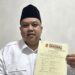 Yudhianto Mahardika Anton Timbang saat menunjukkan B1KWK Partai Gerindra