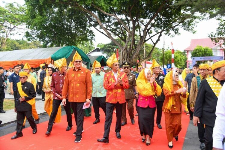 Menkumham saat hadir di HUT Kota Palu