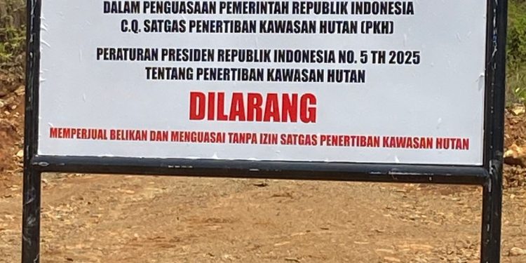 Plang yang dipasang Satgas PKH di lahan PT Masempo Dalle