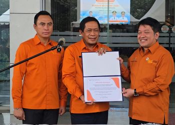 Pencanangan Sensus Ekonomi 2025 melalui Apel Gabungan yang digelar di Lapangan Kantor Gubernur Sultra