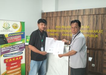 Ketua Korwil KSBSI Sultra, Iswanto saat melaporkan kasus cleaning service Pemkot Kendari ke Kejagung
